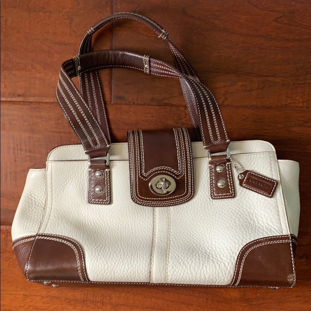 Coach purse off white trimmed in brown leather